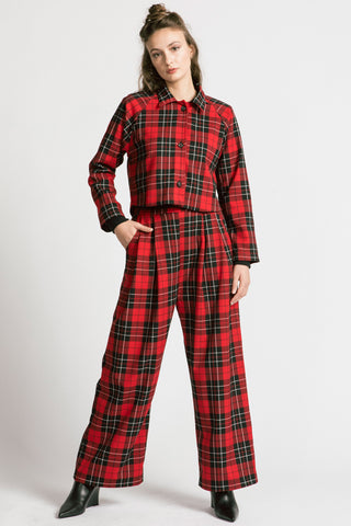 Woman wearing red plaid pants with matching red plaid button up Maurice Jacket by Allison Wonderland. 