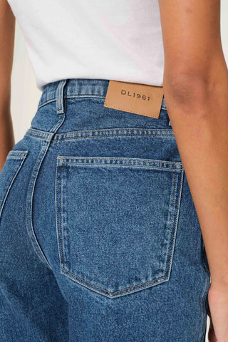 Close-up for waist and back pocket of DL1961 Demie jeans in North Beach wash. 