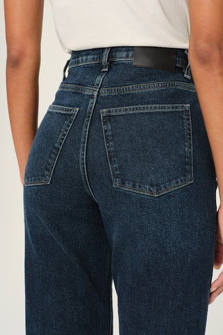 Close-up back view of woman wearing DL1961 Enora Cigarette Jeanin Cromer wash. 