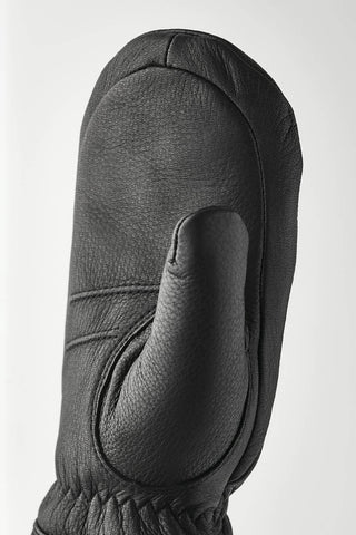 Closeup of black leather Boda Leather mittens. 