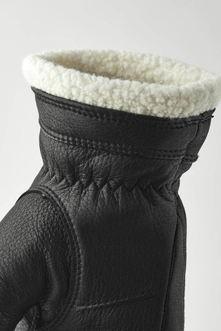 Closeup of black leather Boda Leather mittens. 