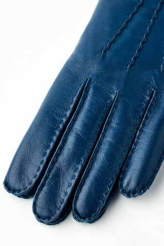 Close-up of midnight blue Mary leather gloves by Hestra. 