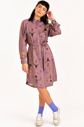 Woman wearing mauve Crop Circle print Ceremony shirt dress by Jennifer Glasgow. 