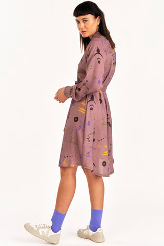 Woman wearing mauve Crop Circle print Ceremony shirt dress by Jennifer Glasgow. 