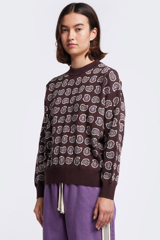 Model wearing brown paisley pattern knit Paisley Sweater by Kloke. 