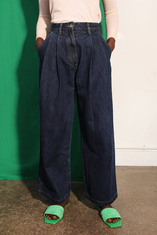 Model wearing wide leg pleated Myles jeans by LF Markey. 