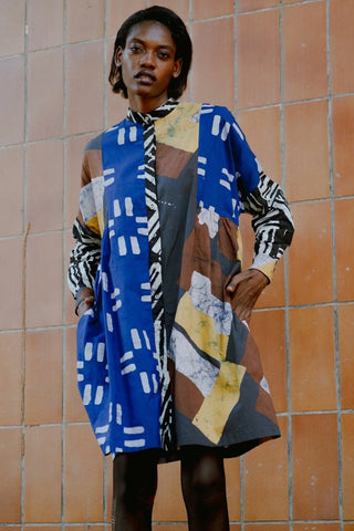 Model wearing Press dress by Osei Duro in multi colour Virtual Reality print. 