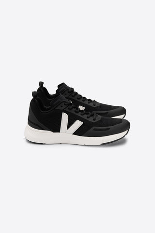 Side view of Black and cream mesh Impala sneakers by Veja. 