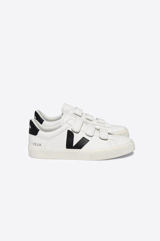 Side view of Veja Recife leather sneakers in white with black logo.