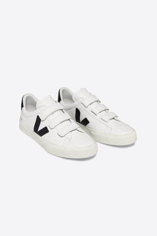 Veja Recife leather sneakers in white with black logo. 