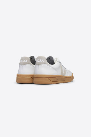 Back view of Veja V-10 sneakers in white ChromeFree leather with Natural suede logo and sole. 